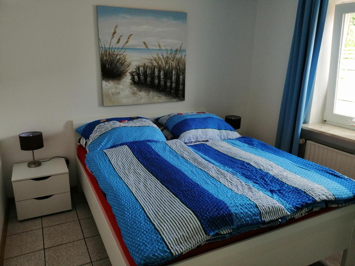 Апартаменты Haus Trossenstek III Бюзум Экстерьер фото